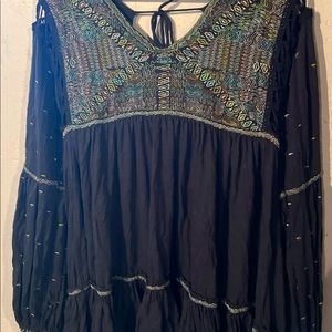 Grey and with neon stitching tunic